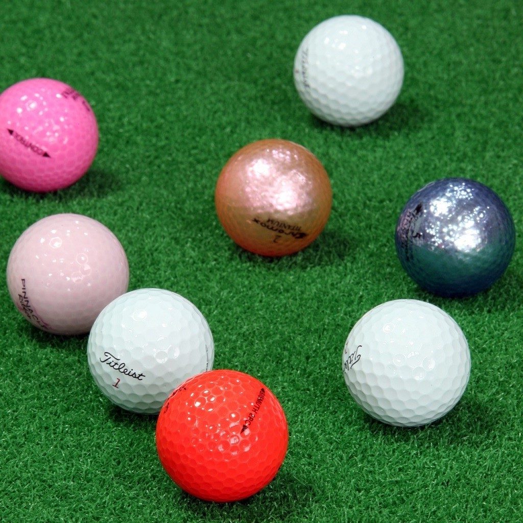 Multiple golf balls with an array of colors